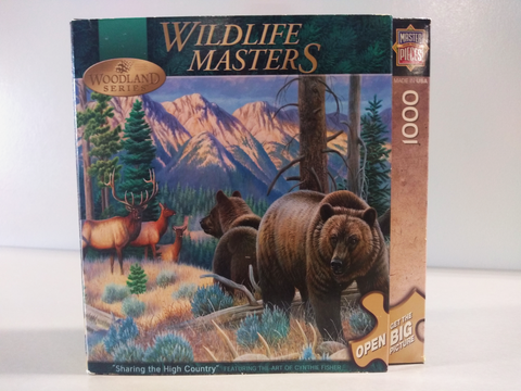 A 1000 piece jigsaw puzzle box, titled "Wildlife Masters" with a picture of two bears and three moose (or maybe deer?) in the mountains